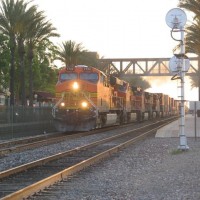 A BNSF Stack train departs Fullerton after letting Amtrak's #4 overtake it. While departing the train gave a awsome shave and haircut.