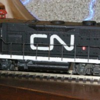 GP35 no4000 - my first repaint job ever. Not perfect, but not shabby either!

To the right, peeking its short hood into the frame, is a Train Master I'm working on, will become CN 2900.