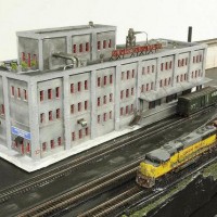 Walther Cornerstone, Woods Furniture Company Kitbashed and ready to plant on the BNSF BenZach Sub