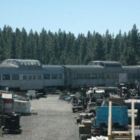 Two of three California Zephyr Dome Coaches being restored at the museum.