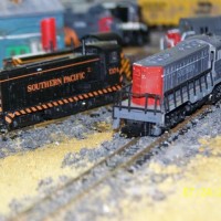 Southern Pacific Vo-1000 in Tiger stripe  and an SD7 at turntable.