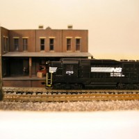 Side view of the GP30 with painted rails and step edges.