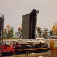 A Concrete Sand Drying Tower in the background remained a part of the yard until the mid 80's when it and the remainder of the yard were disassembled to make way for the Elitch Gardens amusement park along the Platte River.