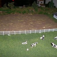 The dairy farm west of town.  I scratch built the fence from styrene rod and styrene strips.
