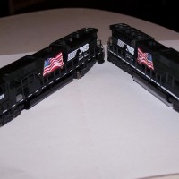 I custom decalled these units to run on my layout.  They are Kato SD80mac and SD90 with UP Flag decals added.