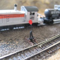 Scratchbuild switch stand in Z-scale.