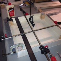 Gluing T-Trak corner module with Titebond wood glue and clamps.