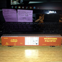 My Buford Shops Western Pacific 86 ft auto boxcar in the "Distribution Dividend" scheme.