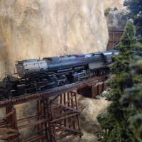 UP4023 crossing a mountain trestle