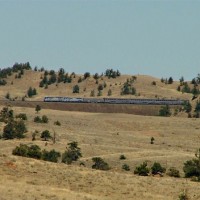 Amtrak #5 charging west on Sherman Hill, not the Moffat Route