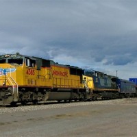 An extremely hot APL stack train with CSX power and a business car