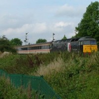 Class 47 on a Skegness special passing Sleaford West