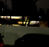 BiLeveel Commuter Over the Fence in the Dark 20210909_202842_capture.png