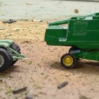 Deere combine and Steiger tractor