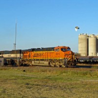 BNSF ES44AC 6072 leading SB coalie across UP and BNSF's ex-FW&D diamond