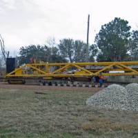 Placing ties under the rails.