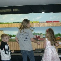 Young Folks enjoying trains