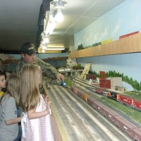 Young Folks enjoying trains