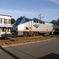 Amtrak 178 shoots past in the late sun.