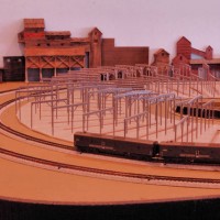 The Double Track Mainline Passes Around the Roundhouse