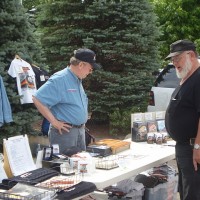 Fat guy selling memorabilia