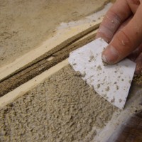 spreading plaster