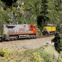 BNSF waits in the hole for a UP manifest to pass on the BNSF BenZach Sub