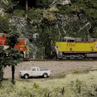 BNSF waits in the hole for a UP manifest to pass on the BNSF BenZach Sub