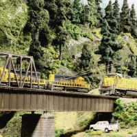 UP and ATSF (BNSF) freights pass as they cross a ravine_8-12-2011