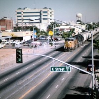 UP6161 leads NB unit grain train, 9th St, Modesto, 7-27-1998