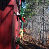 Shot from back of the tanker, pulling the caboose and fan car