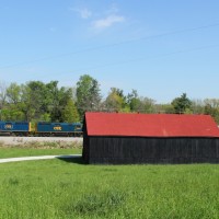 CSX Derby special heading west for Louisville, KY passing a farm in Shelbyville, KY