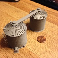 Two Behlen corn bins .