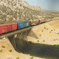 West bound WP freight crossing the Humboldt river in Golconda, Nevada