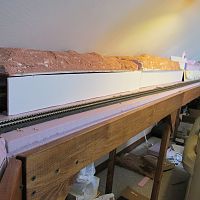 Side walls added to scenic staging cover
