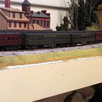 Athearn Heavyweight Passenger train passing Owl Industries