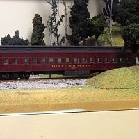 Athearn heavy weight coach, repainted for B&M, exiting my Hoozat Tunnel.