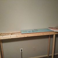 Third L-Grider support bolted to the wall