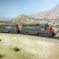 A pair of Southern Pacific GP30's pull a freight through the Nevada desert