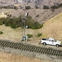 Signal maintainers working on a searchlight signal