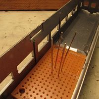Constant brightness circuit board installed in radiator bulge of RDC
