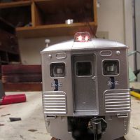 Shell with headlamps installed and lighting up.