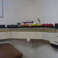Unit tank car train passing Lotta Rock dairy farm