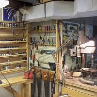 Paint shelf & drill press.