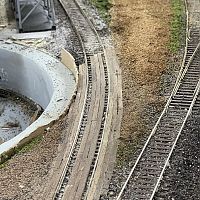 Wooden grade crossing and gravel road