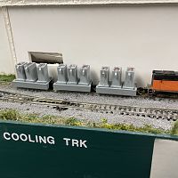 Set out the yellow hot ingot molds on the Cooling track outside the Stripper Room of the Blooming MIll.