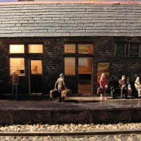 Platform after rain 00 scale. Water brushed onto the platform.
Scratchbuilt platform and station building.