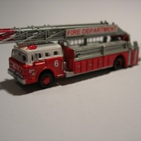 Ford C Crew Cab Ladder Fire Truck. Cab from Athearn, Ladder is from Tomytec and the Body is from a Micro Machines Modell. Custom Made Decals