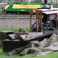 1/8 scale Willamette steam donkey.  We used this as the yarder.  The tarp conceals an air compressor setup, which was used in lieu of steam to operate the donkey.  In the back one can see one of the 1/8 scale locomotives that was being operated on the Willow Creek Railroad that day - August 3, 2008, during the Steam-Up at Antique Powerland in Brooks, Oregon.