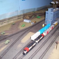 The "Kimberly Turn" is seen here on a Prairie City industrial siding on its return trip to Ochoco Junction. Upon leaving Ochoco Junction, the KT drops off a cut of cars in John Day for the local to switch the industries at John Day and Prairie City, and picks up cars going to Ochoco Junction on the return trip. The KT does the local switching in Mt. Vernon, Dayville, and Kimberly.